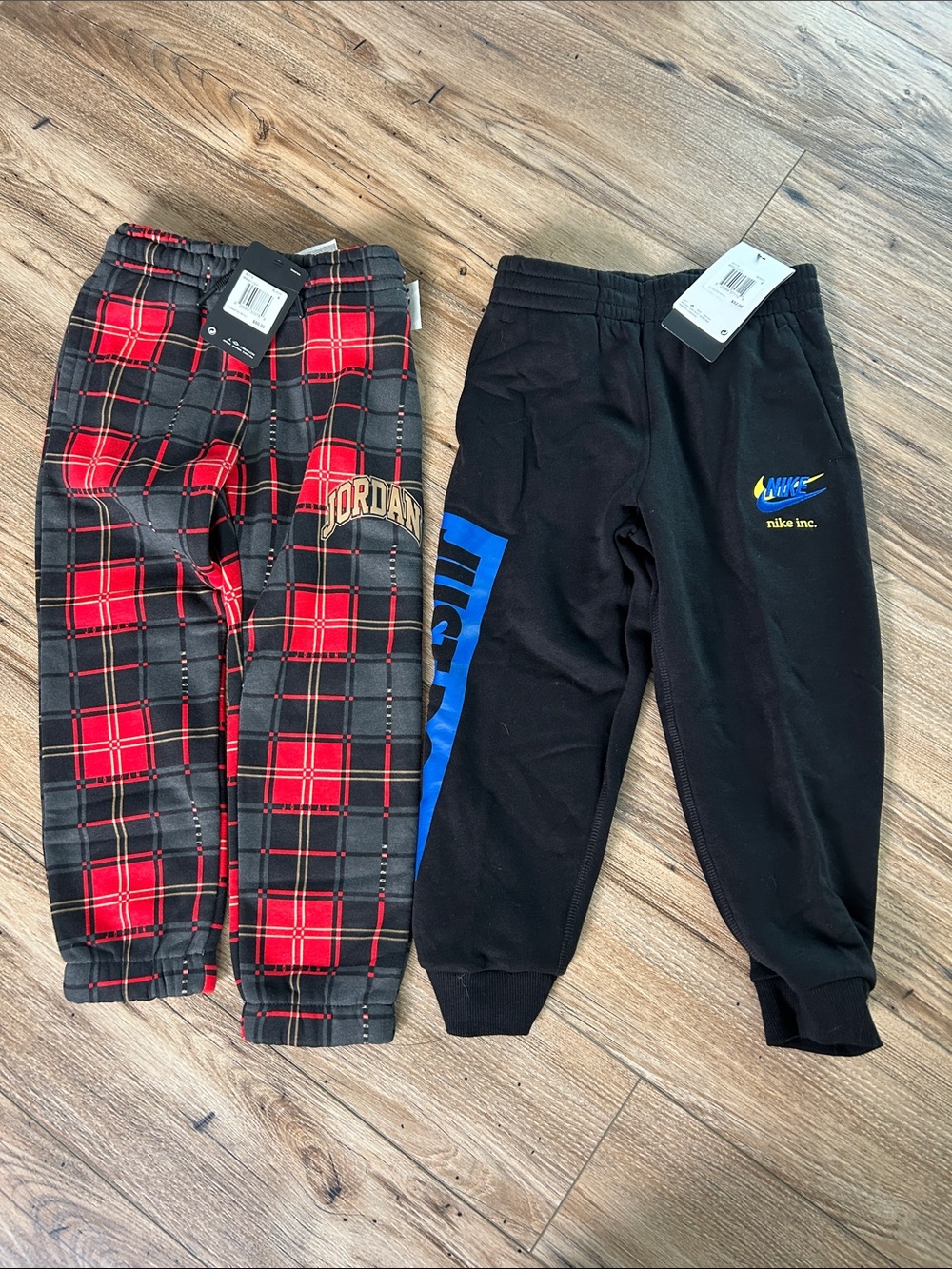 Nike Black Sweatpants with Blue & Yellow Logo